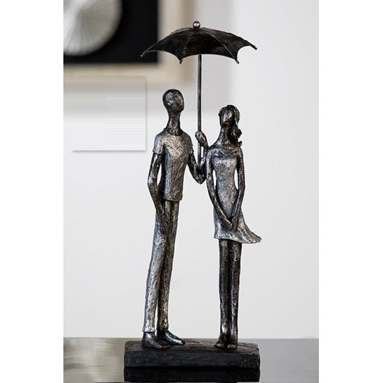 Read more about Umbrella sculpture in antique silver with black base