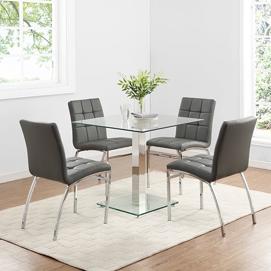 Photo of Hartley glass bistro table with 4 grey coco chairs
