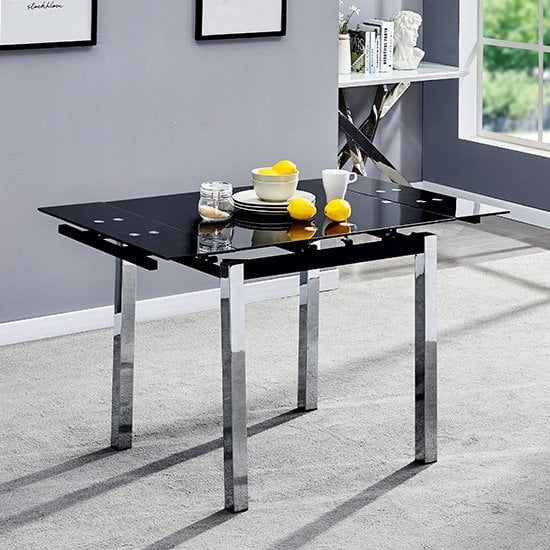 Product photograph of Paris Extending Black Glass Dining Table With Chrome Metal Legs from Furniture in Fashion