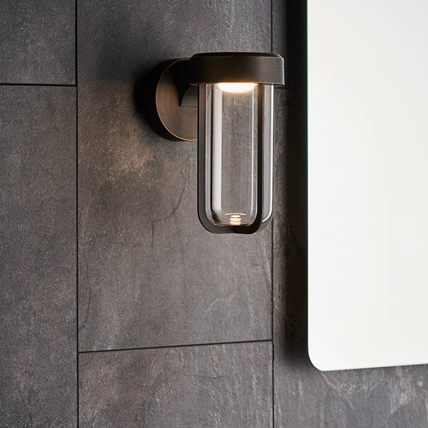 Read more about Afton clear glass shade bathroom wall light in brushed bronze