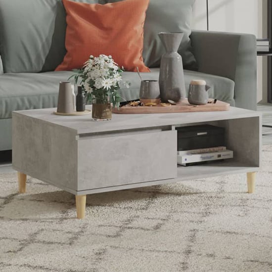 Read more about Agron wooden coffee table with 1 door in concrete effect