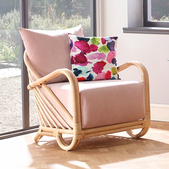Read more about Akure rattan armchair with velvet blush seat cushion