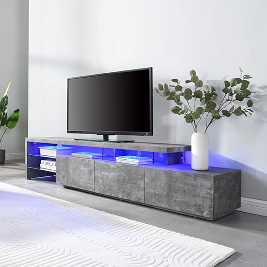 alanis wooden tv stand with storage in concrete and led lights