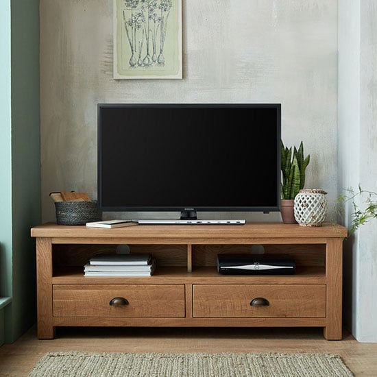 Photo of Albas wooden large tv unit in planked solid oak