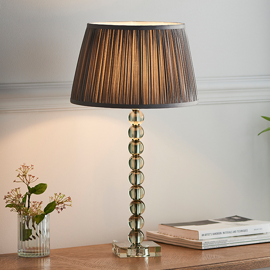 Photo of Alcoy charcoal shade table lamp with grey green crystal base