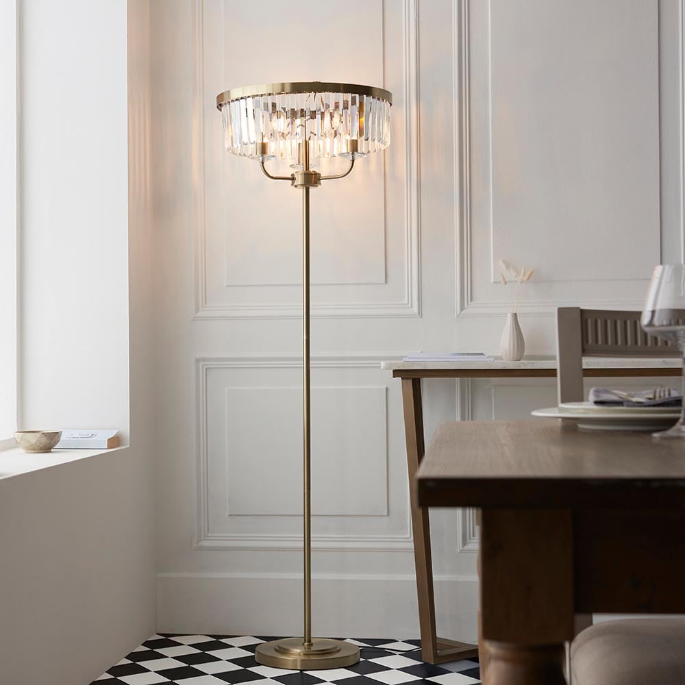 Product photograph of Allston Clear Glass Floor Lamp In Antique Brass from Furniture in Fashion