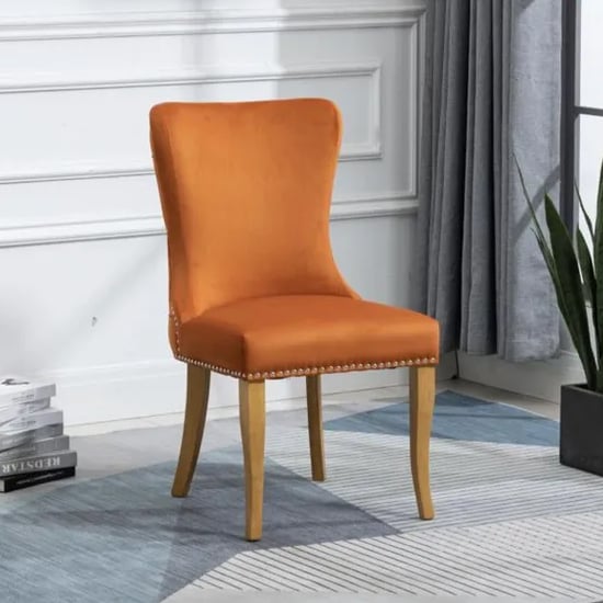 alpine fabric dining chair in burnt orange with oak wooden legs