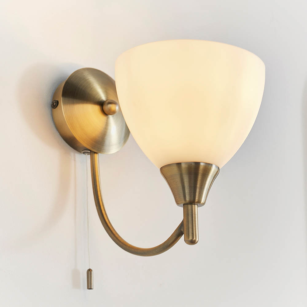 Product photograph of Alton Matt Opal Glass Shade Wall Light In Antique Brass from Furniture in Fashion