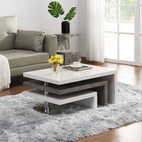 Read more about Amani white high gloss rotating coffee table in concrete effect