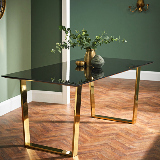 Product photograph of Antebi High Gloss Dining Table With Gold Legs In Black from Furniture in Fashion