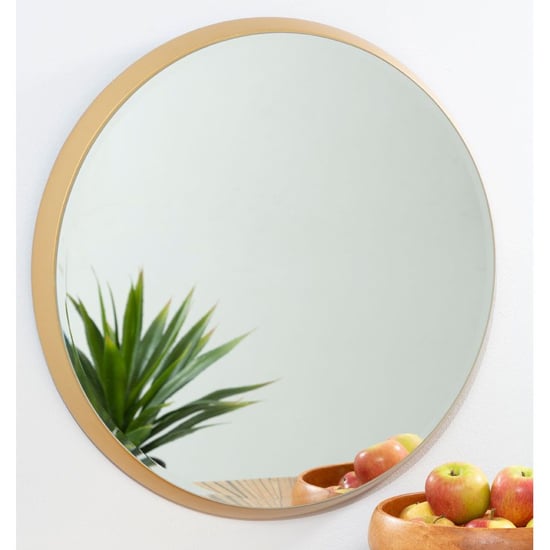 Photo of Athens large round wall bedroom mirror in gold frame