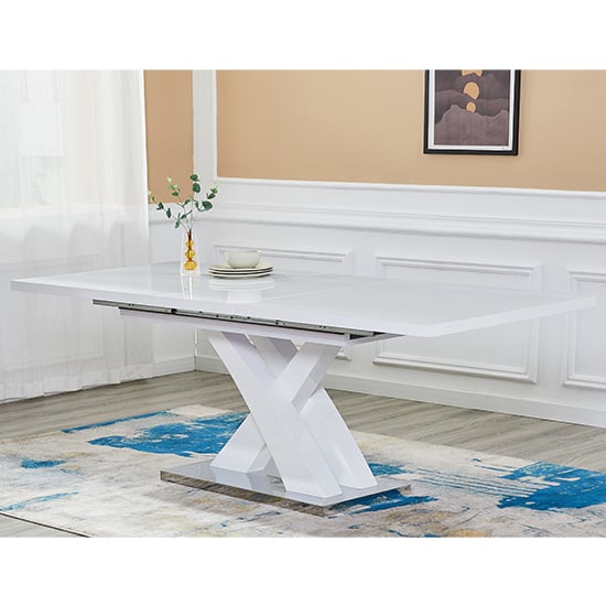 Photo of Axara large extending high gloss dining table in white