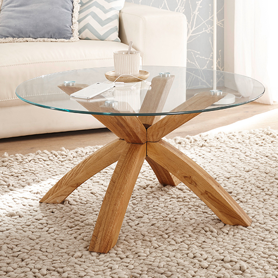Read more about Bacoor round glass coffee table with oak wooden legs