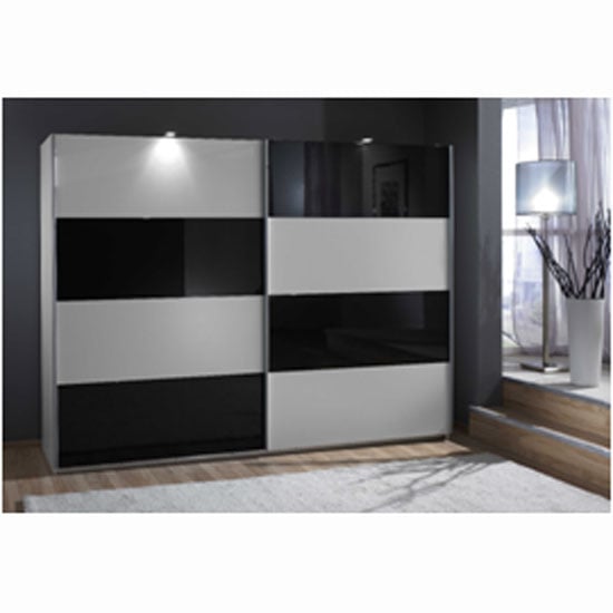 Read more about Easy plus sliding wardrobe in white and black glass