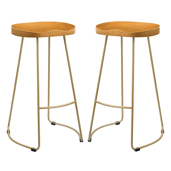 Photo of Boleyn natural wooden bar stools with gold metal legs in pair