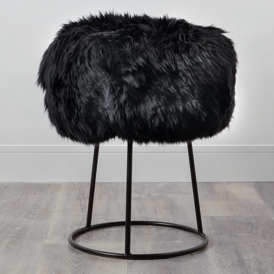 Product photograph of Bovril Sheepskin Stool With Black Metal Legs In Black from Furniture in Fashion