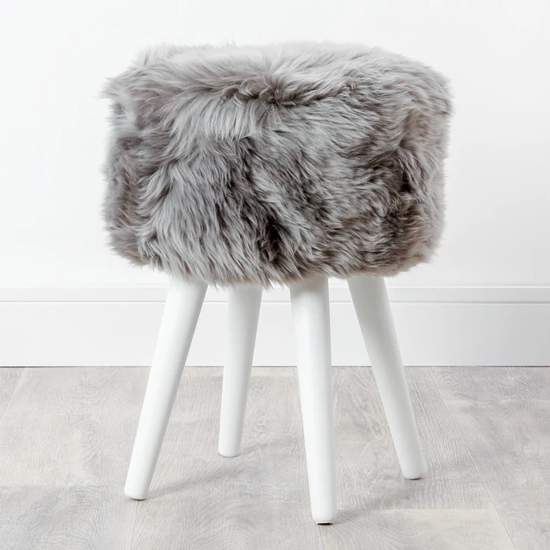 Read more about Bovril sheepskin stool with white wooden legs in grey