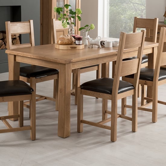 Photo of Brex large wooden extending dining table in natural