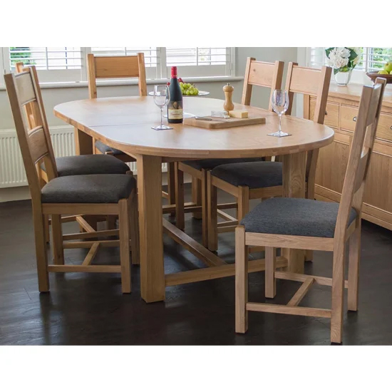 Product photograph of Brex Oval Wooden Extending Dining Table With 8 Chairs from Furniture in Fashion