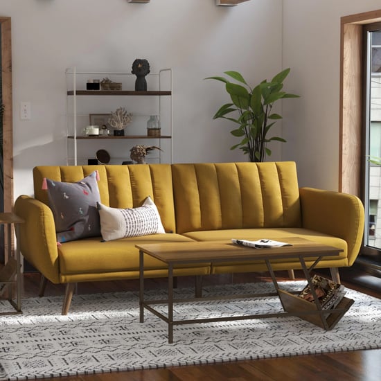 Read more about Brittan linen sofa bed with wooden legs in mustard