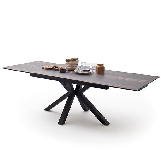 Read more about Brooky glass extendable dining table in barique wood metal frame