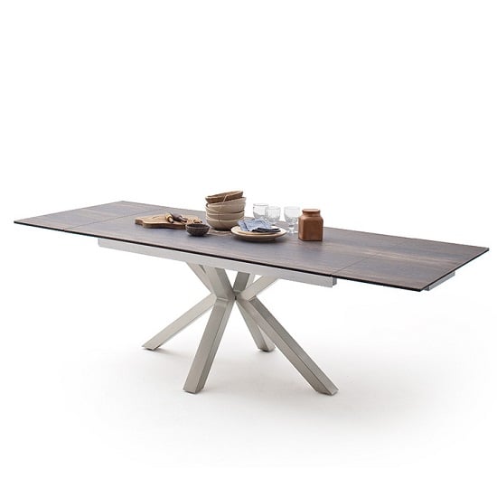 Read more about Brooky glass extendable dining table in barique wood steel frame