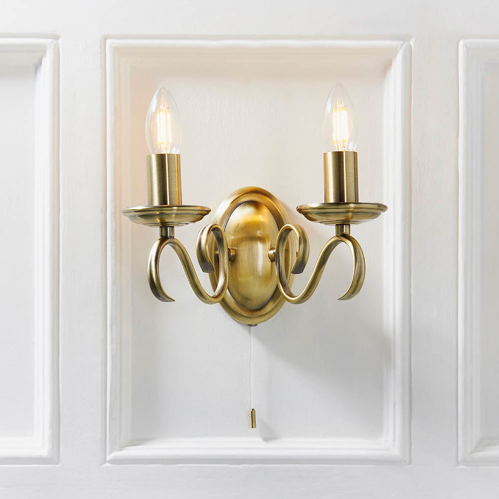 Read more about Brunswick 2 lights glass twin wall light in antique brass