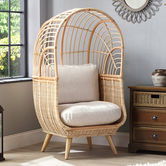 Read more about Cainta rattan armchair with smooth beige seat cushion