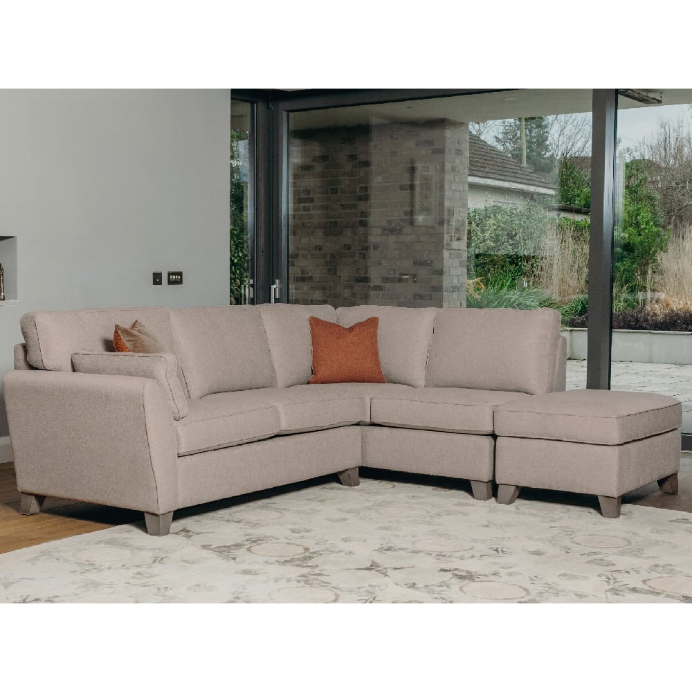 Product photograph of Castro Fabric Right Hand Corner Sofa With Oak Legs In Biscuit from Furniture in Fashion