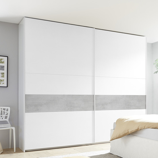 Read more about Civico wide slide door wardrobe in matt white and cement effect