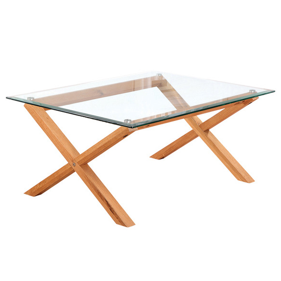 Product photograph of Codex Clear Glass Coffee Table With Oak Wooden Legs from Furniture in Fashion