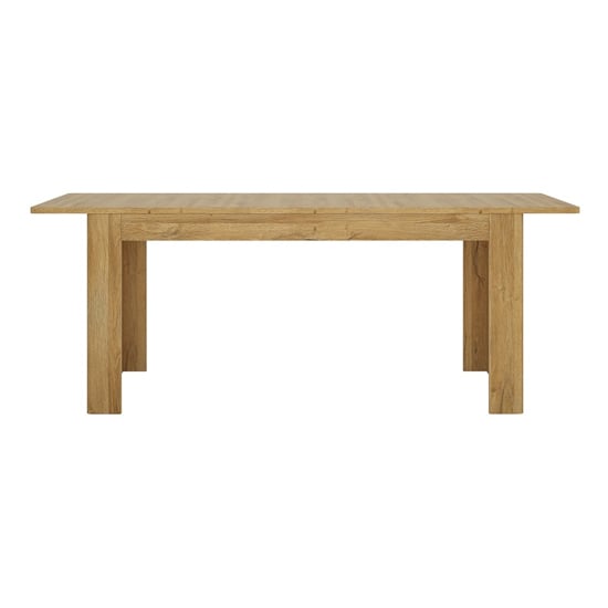 Photo of Corco extending wooden dining table in grandson oak