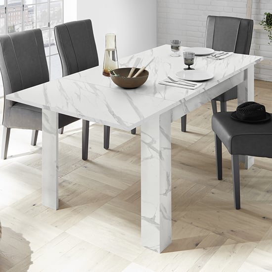 Photo of Corvi extending wooden dining table in white marble effect