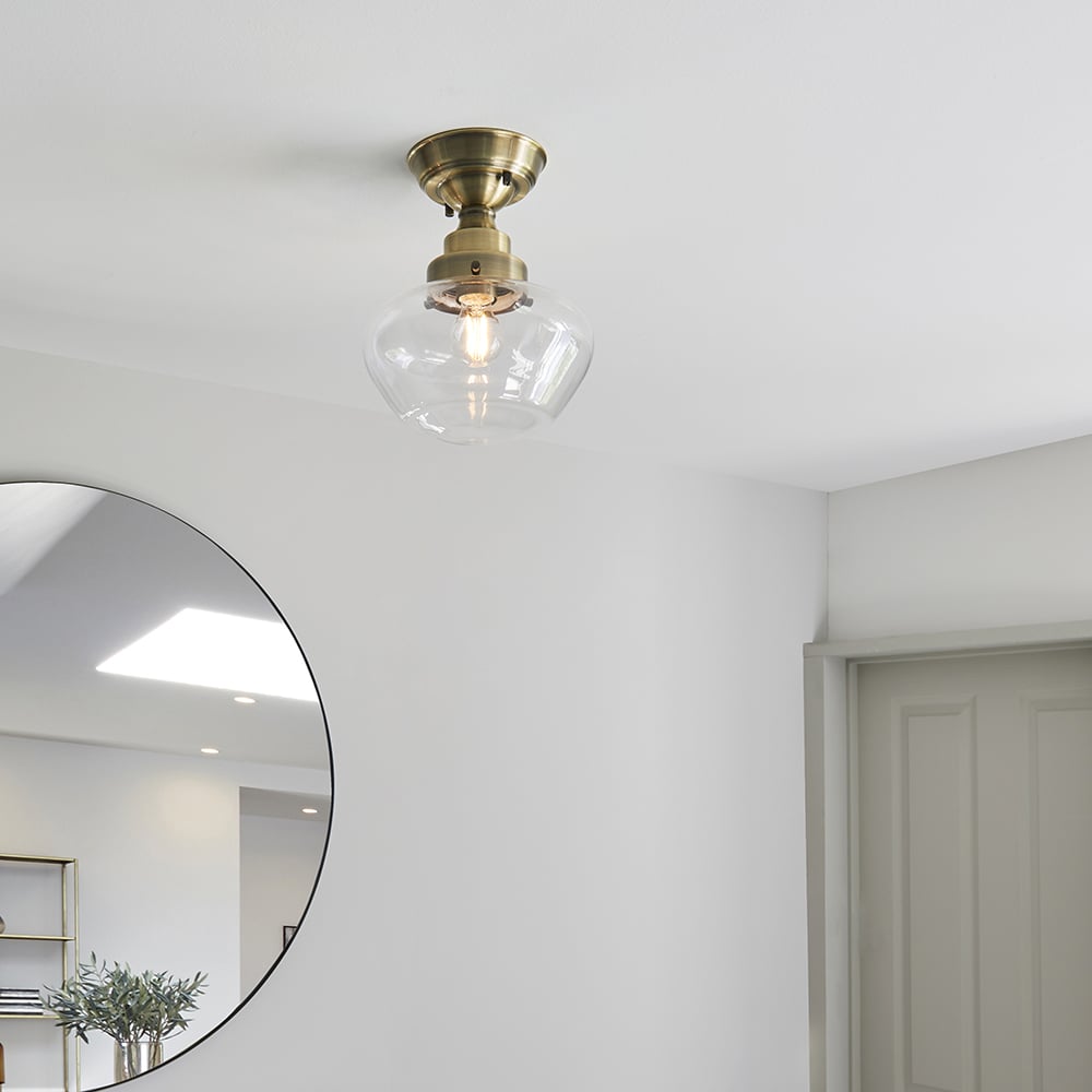 Product photograph of Crowley Clear Glass Semi-flush Ceiling Light In Antique Brass from Furniture in Fashion