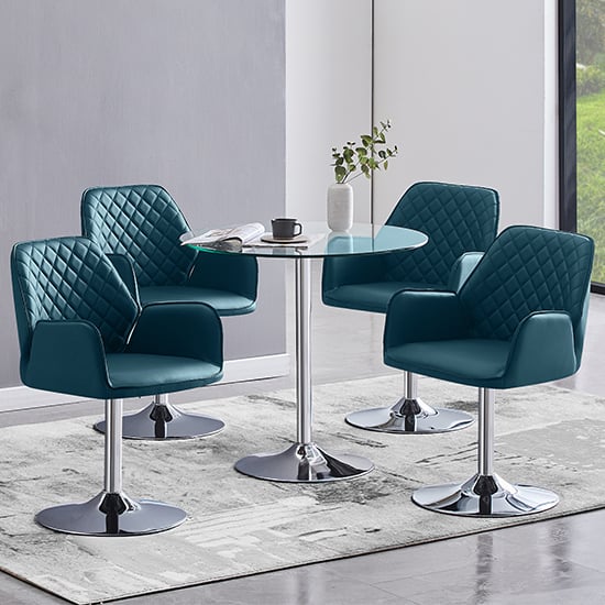 Photo of Dante clear glass dining table with 4 bucketeer teal chairs