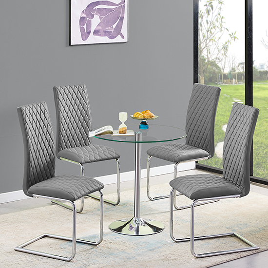 Read more about Dante round clear glass dining table with 4 ronn grey chairs