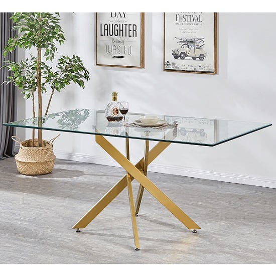 Read more about Daytona large clear glass dining table with brushed gold legs