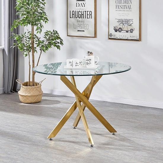 Product photograph of Daytona Round Clear Glass Dining Table With Brushed Gold Legs from Furniture in Fashion