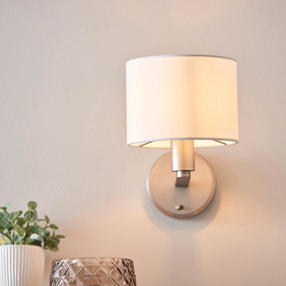 Product photograph of Deland White Fabric Shade Wall Light In Matt Nickel from Furniture in Fashion