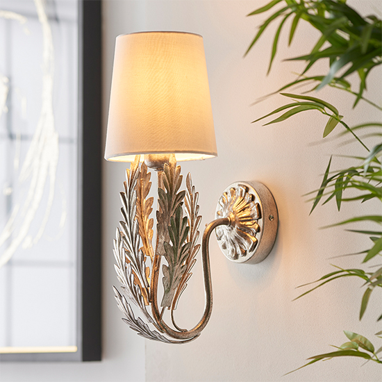 Product photograph of Delphine Leaf Wall Light In Silver With Ivory Shade from Furniture in Fashion