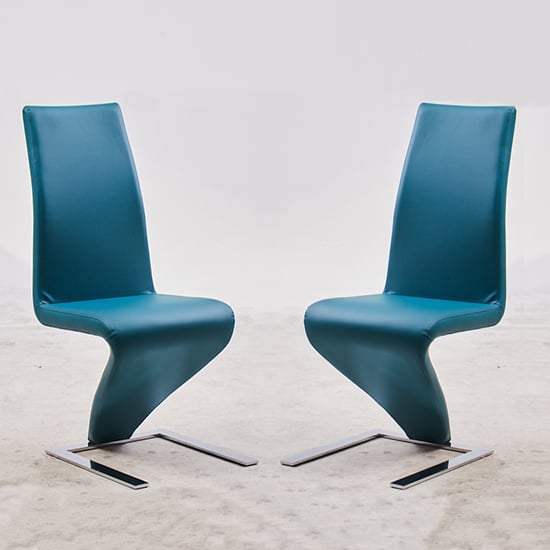 Read more about Demi z teal faux leather dining chairs with chrome feet in pair