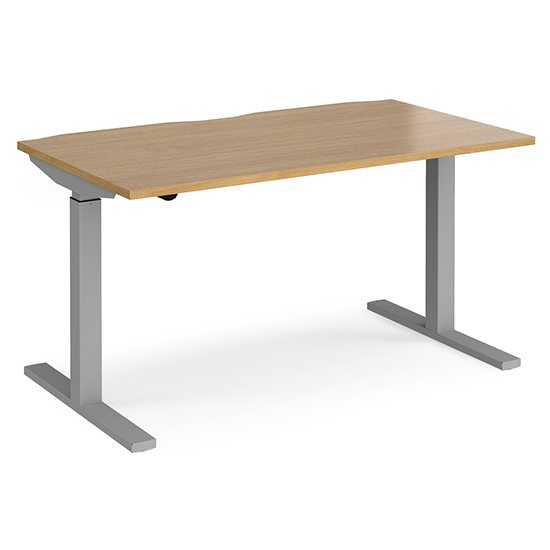Photo of Elev 1400mm electric height adjustable desk in oak and silver