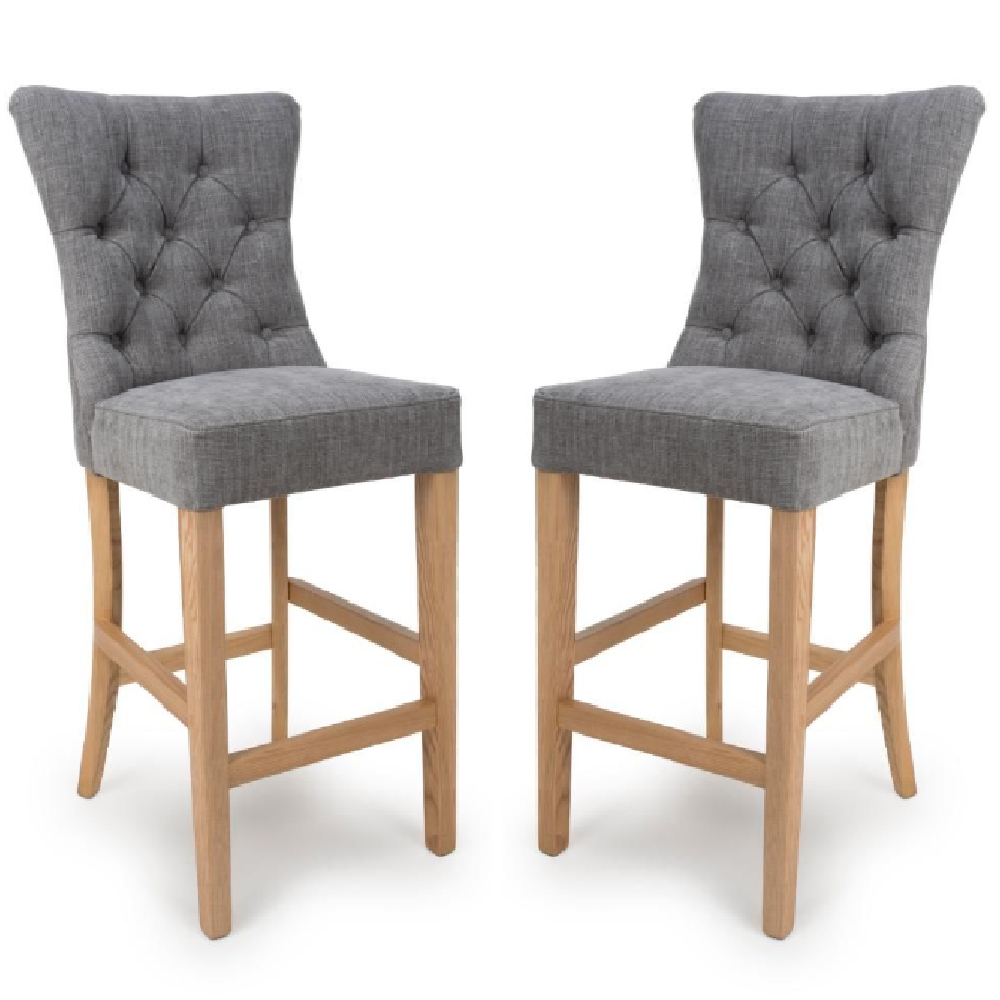 Read more about Elyria grey fabric bar stool with oak legs in pair