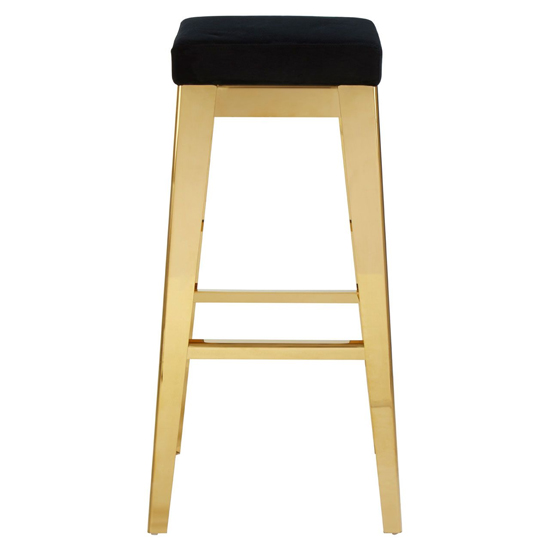 Photo of Fafnir black velvet bar stool with gold stainless steel legs