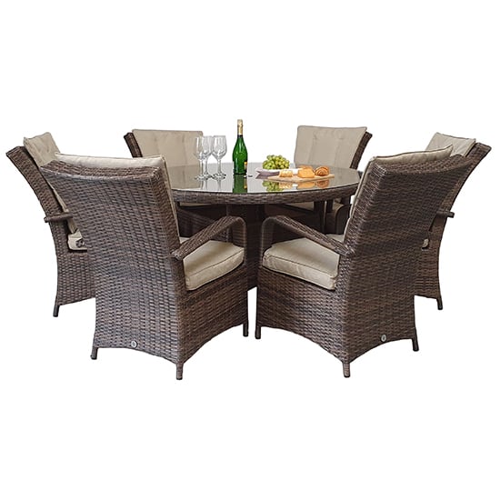 Photo of Fetsa round 135cm dining table with 6 armchairs in brown weave