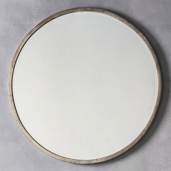 Read more about Haggen large round bedroom mirror in antique silver frame