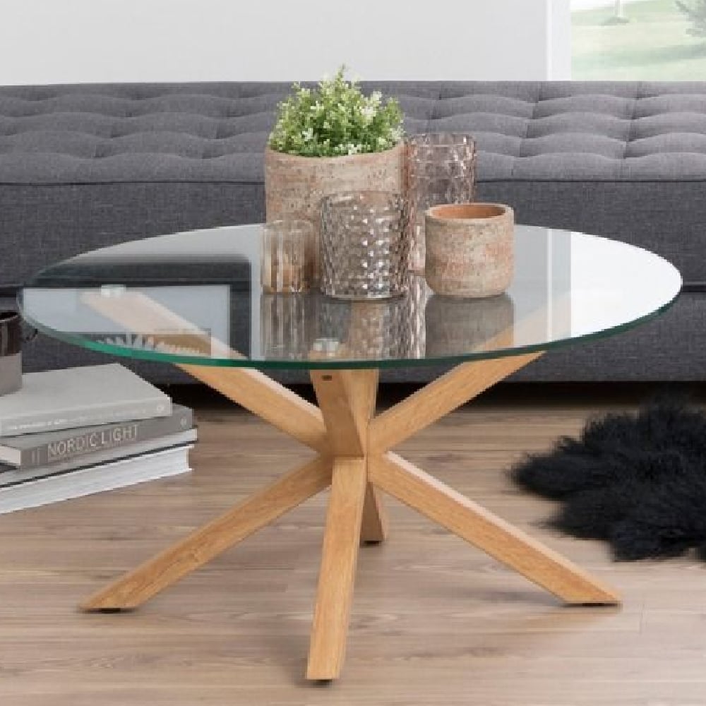 haines glass coffee table round with oak legs in clear