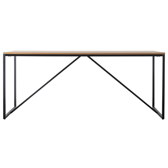 Photo of Hanley wooden dining table with black metal frame in natural