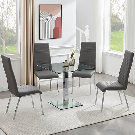Read more about Hartley clear glass dining table with 4 dora grey chairs
