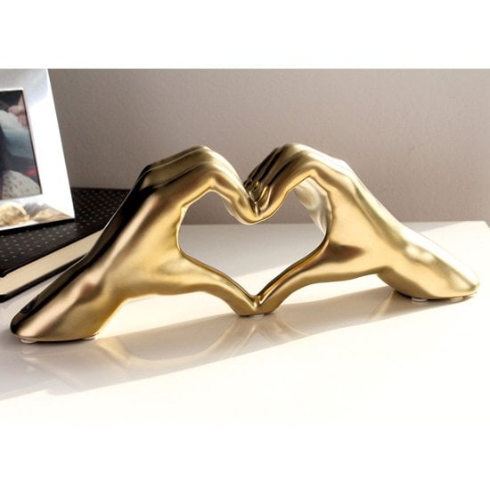 Photo of Heart ceramic hand sculpture in gold